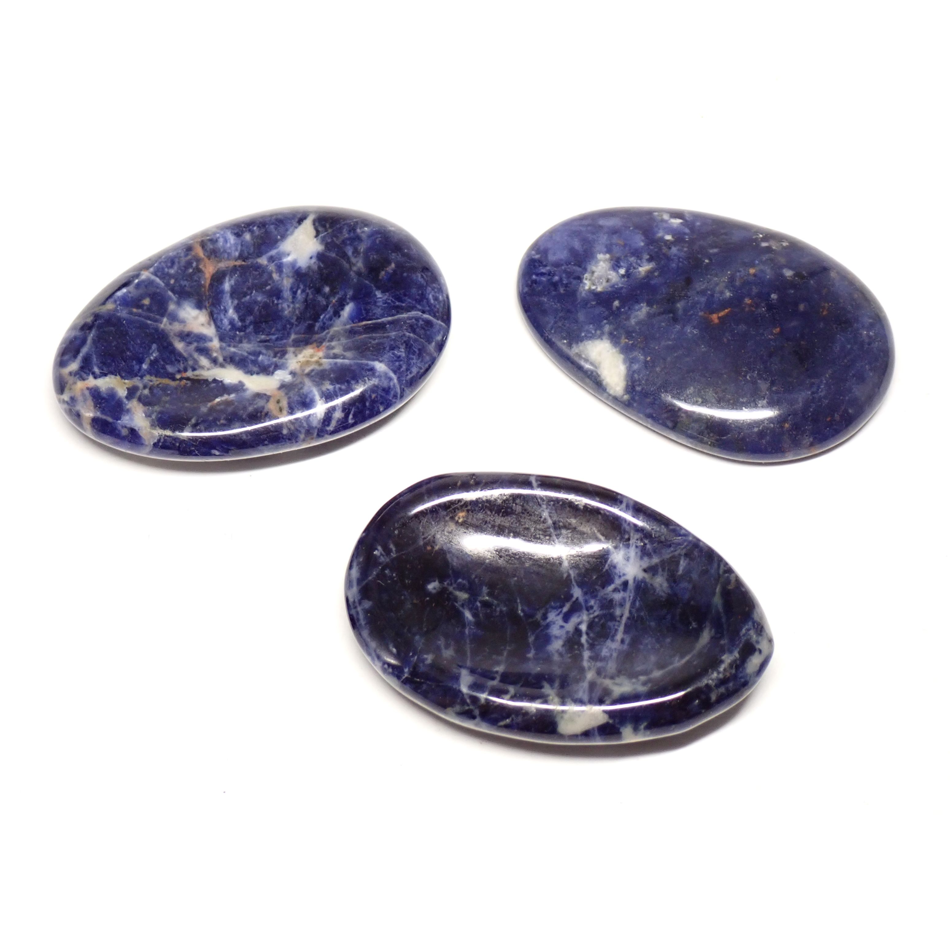 Photo de trois pierres pouce/worry stone en Sodalite